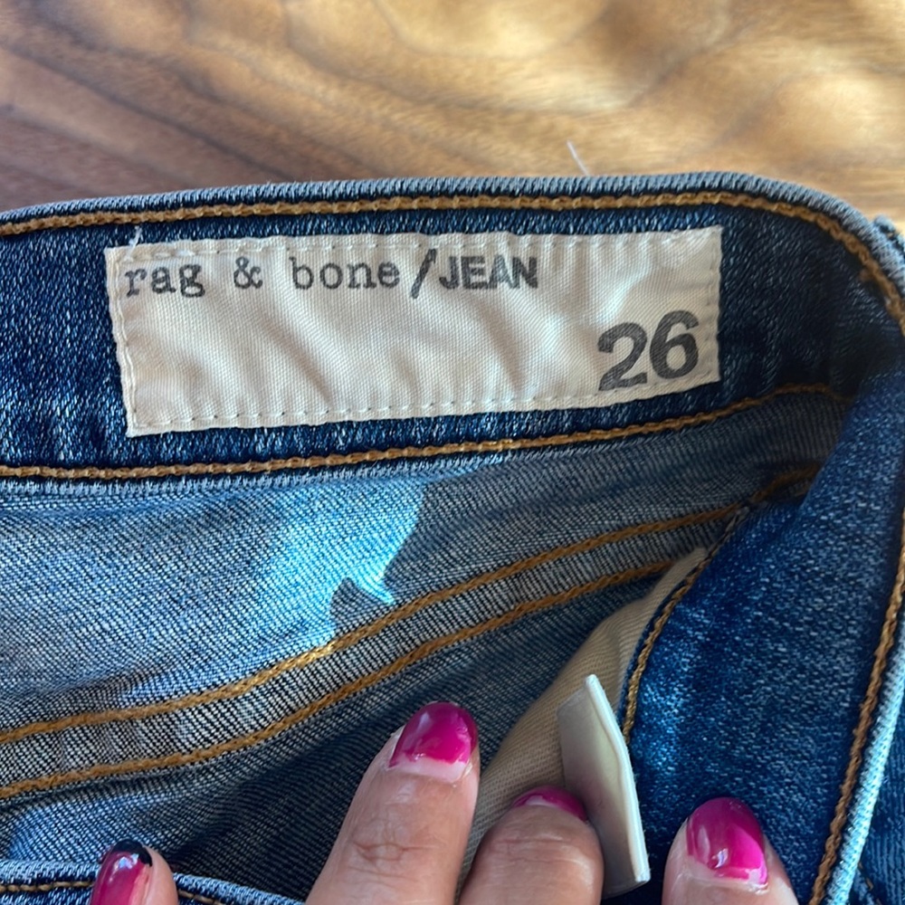 Rag and Bone skinny jeans with holes and Buffalo plaid flannel patches